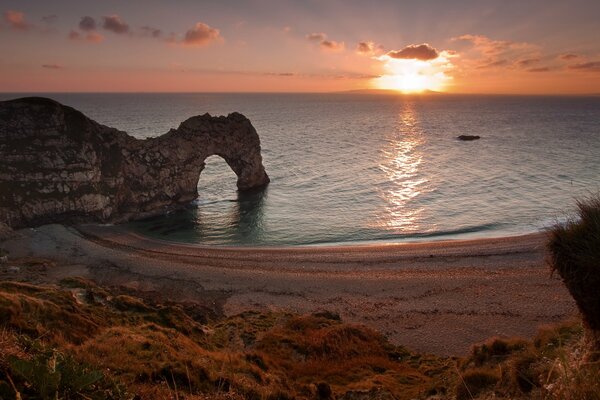 Sunset of a sandy beach in England