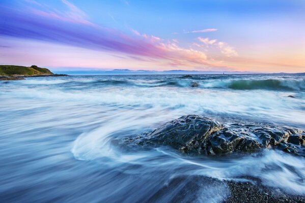 Rocks in the sea at dawn