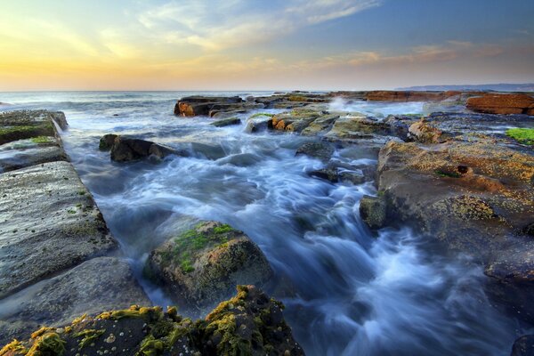 Magnificent landscape. The raging sea among the rocks