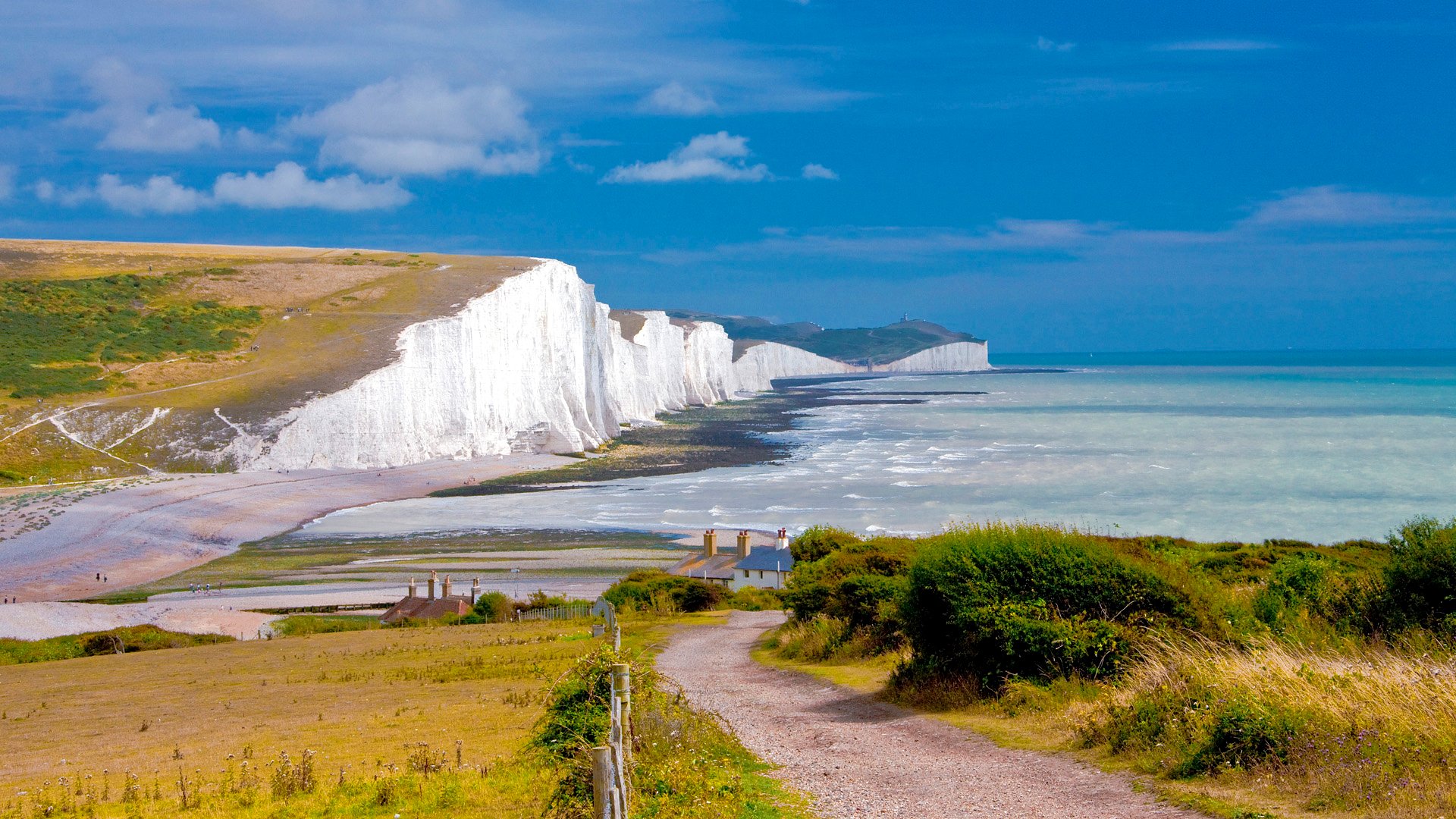 ky clouds broken rock tree road sea england house