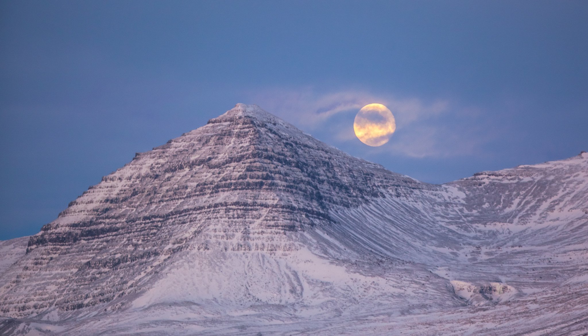 iceland mountain snow night moon full moon sky clouds haze