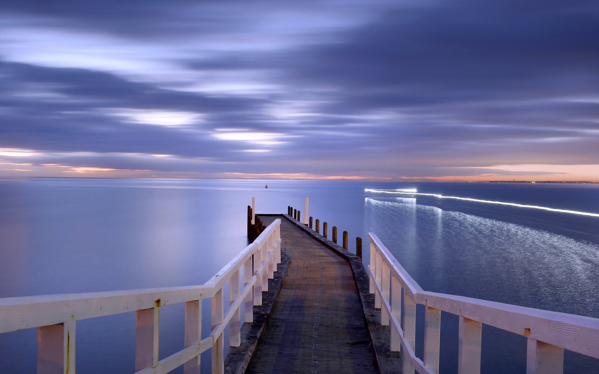 puesta de sol mar puente paisaje