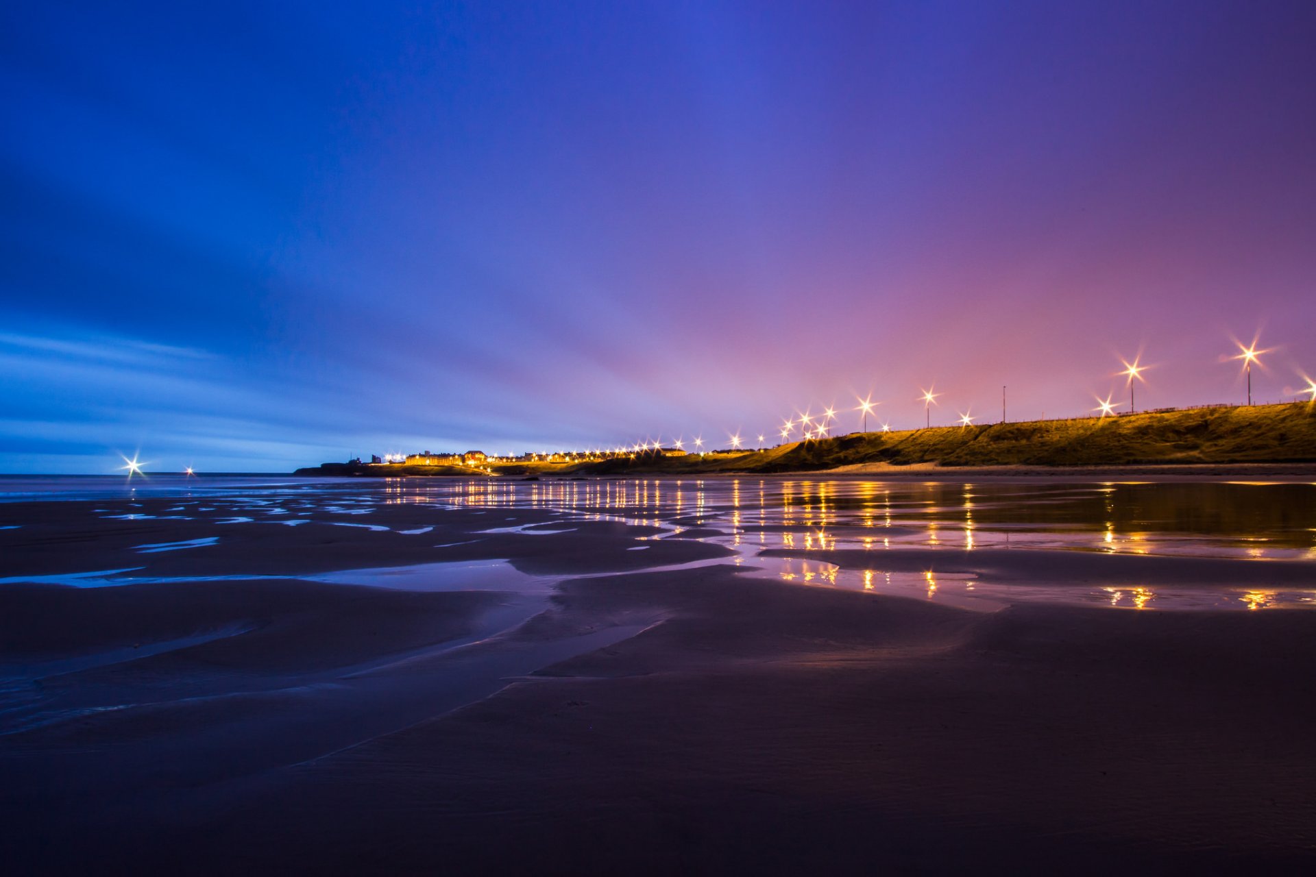 regno unito inghilterra mare del nord bassa marea costa costa illuminazione luci lanterne notte blu viola cielo