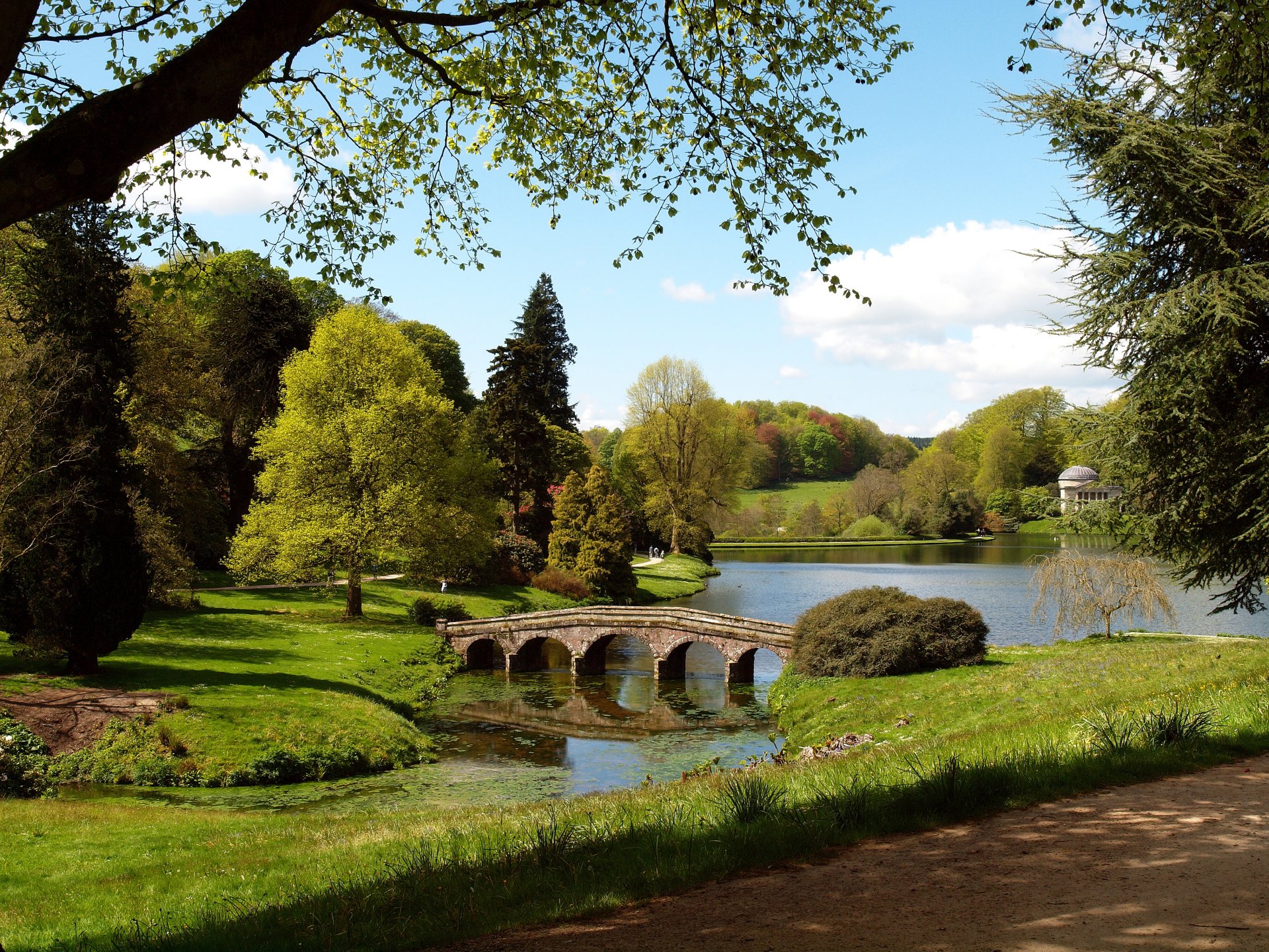 wiltshire england lake bridge pond track people tree gra