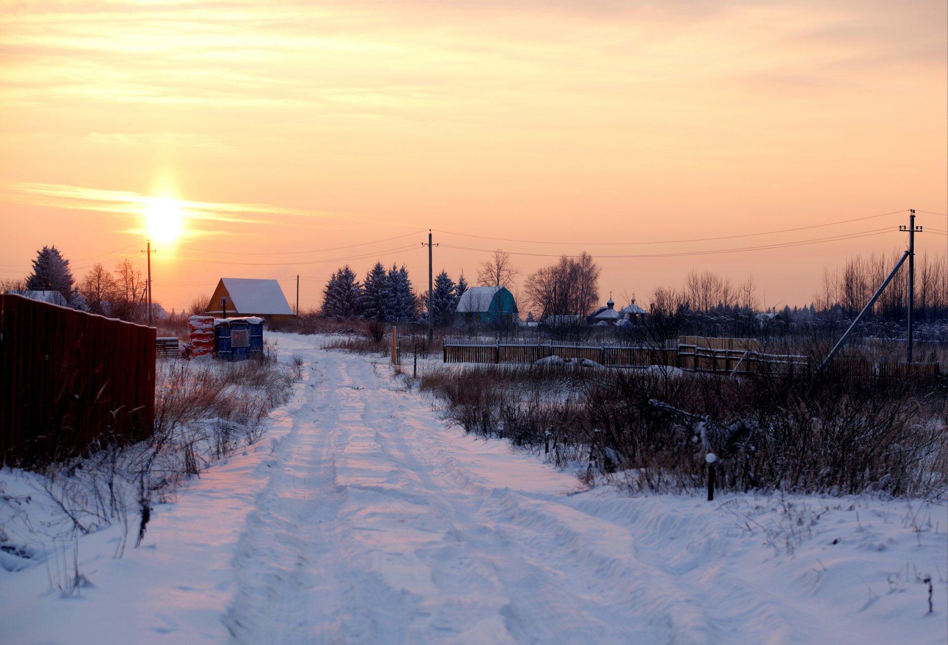 winter snow traces suburban village sun sunrise