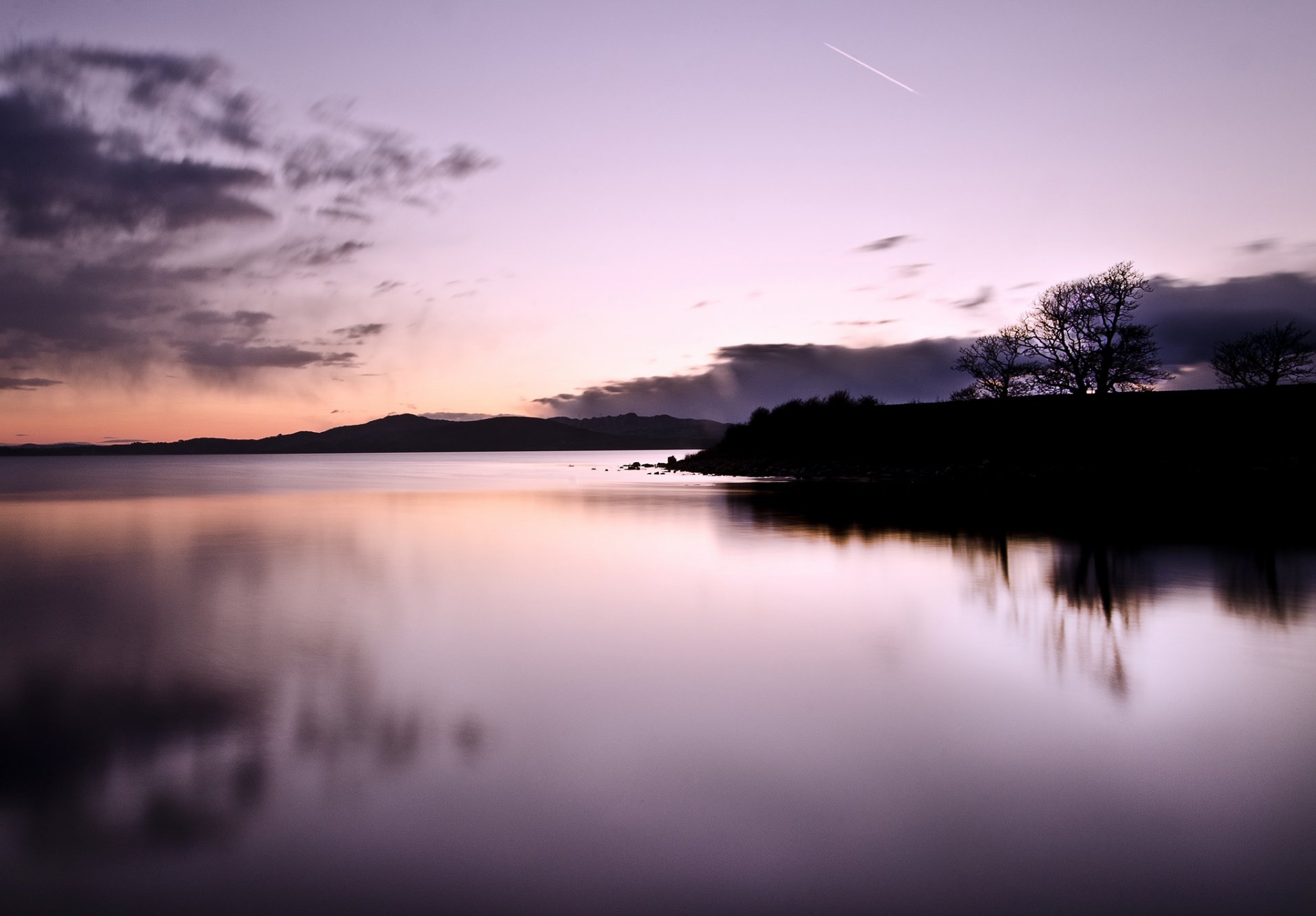 twilight lake night tree silhouettes clouds sky meteor