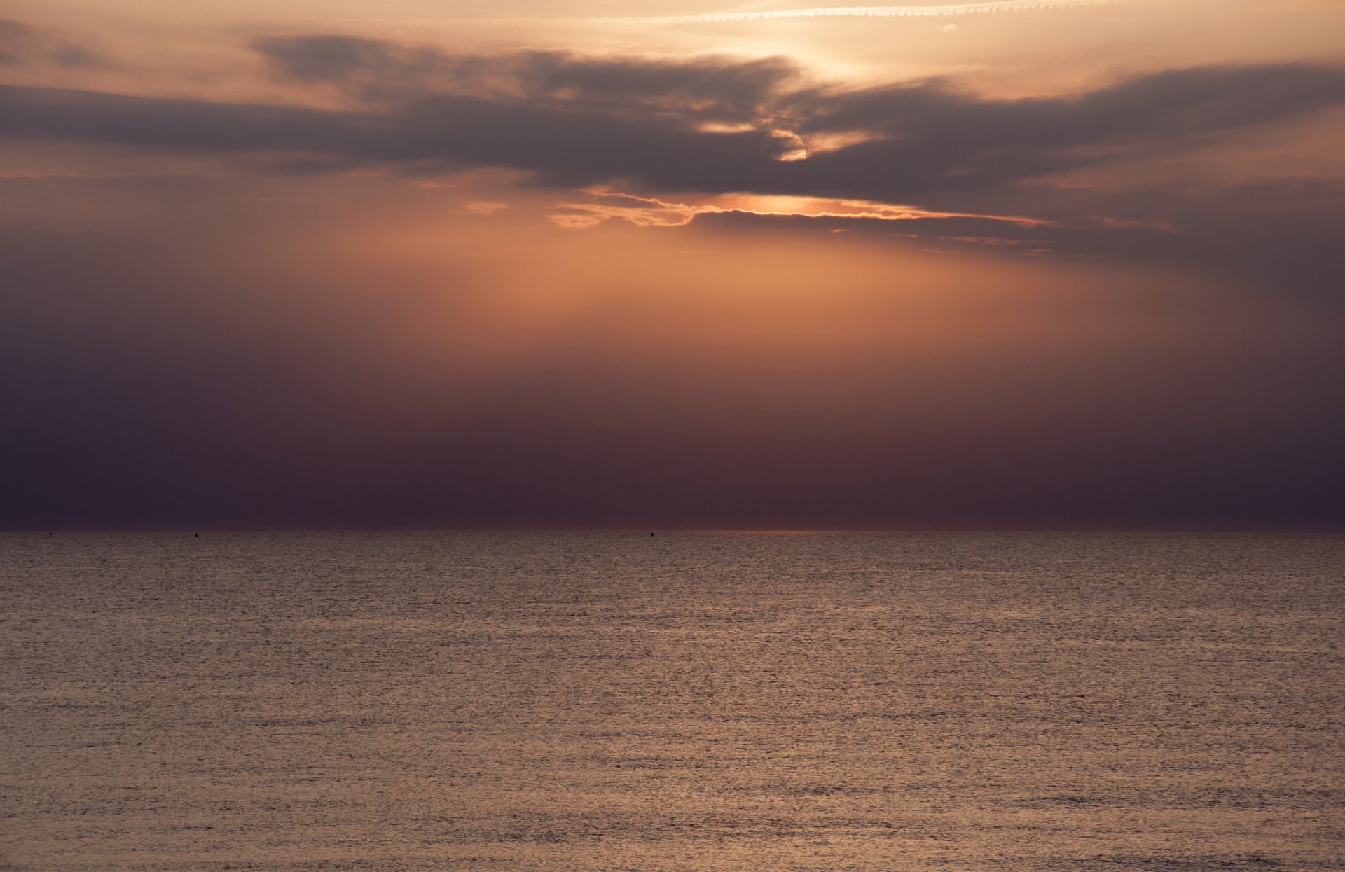 mare nuvole orizzonte sole