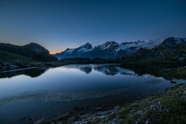 In the mountains at night you can find an incredible landscape on the lake