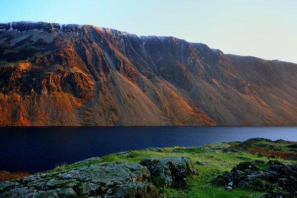 Wonderful sunset on the background of mountains and lakes