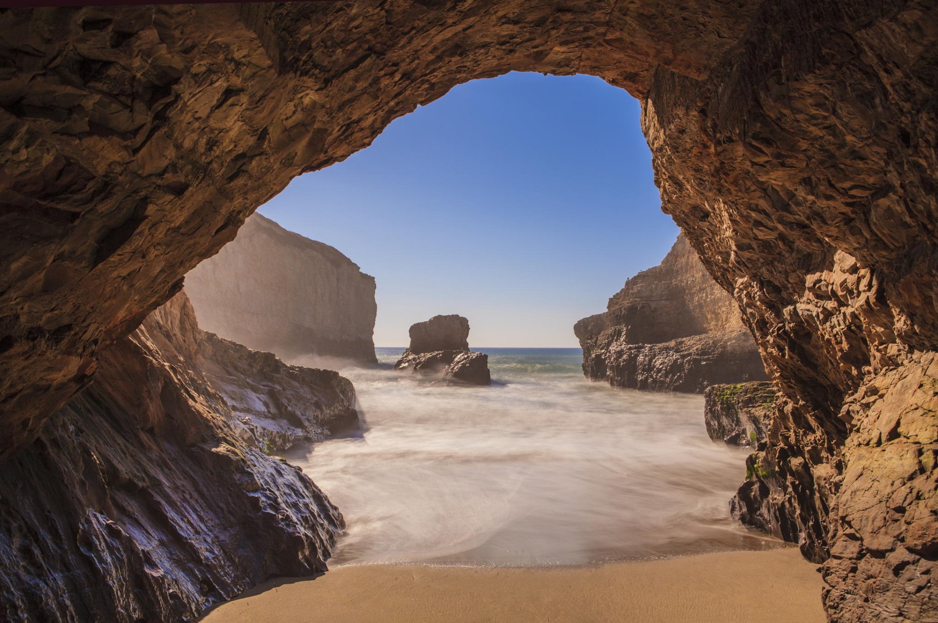 plaża jaskinia ocean klify kalifornia wybrzeże davenport autostrada 1 naturalny most santa cruz zatoka płetwy rekina