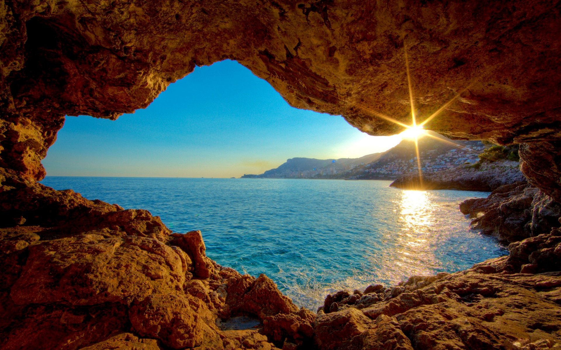 meer küste felsen höhle sonne sonnenuntergang