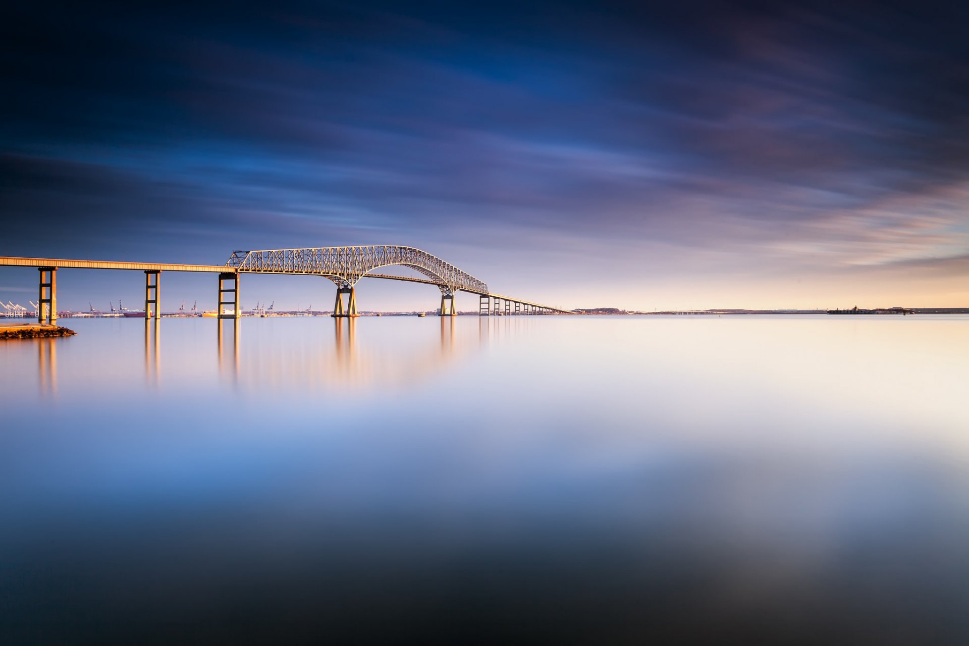 stati uniti maryland baltimora giorno ponte fiume acqua superficie liscia blu cielo nuvole