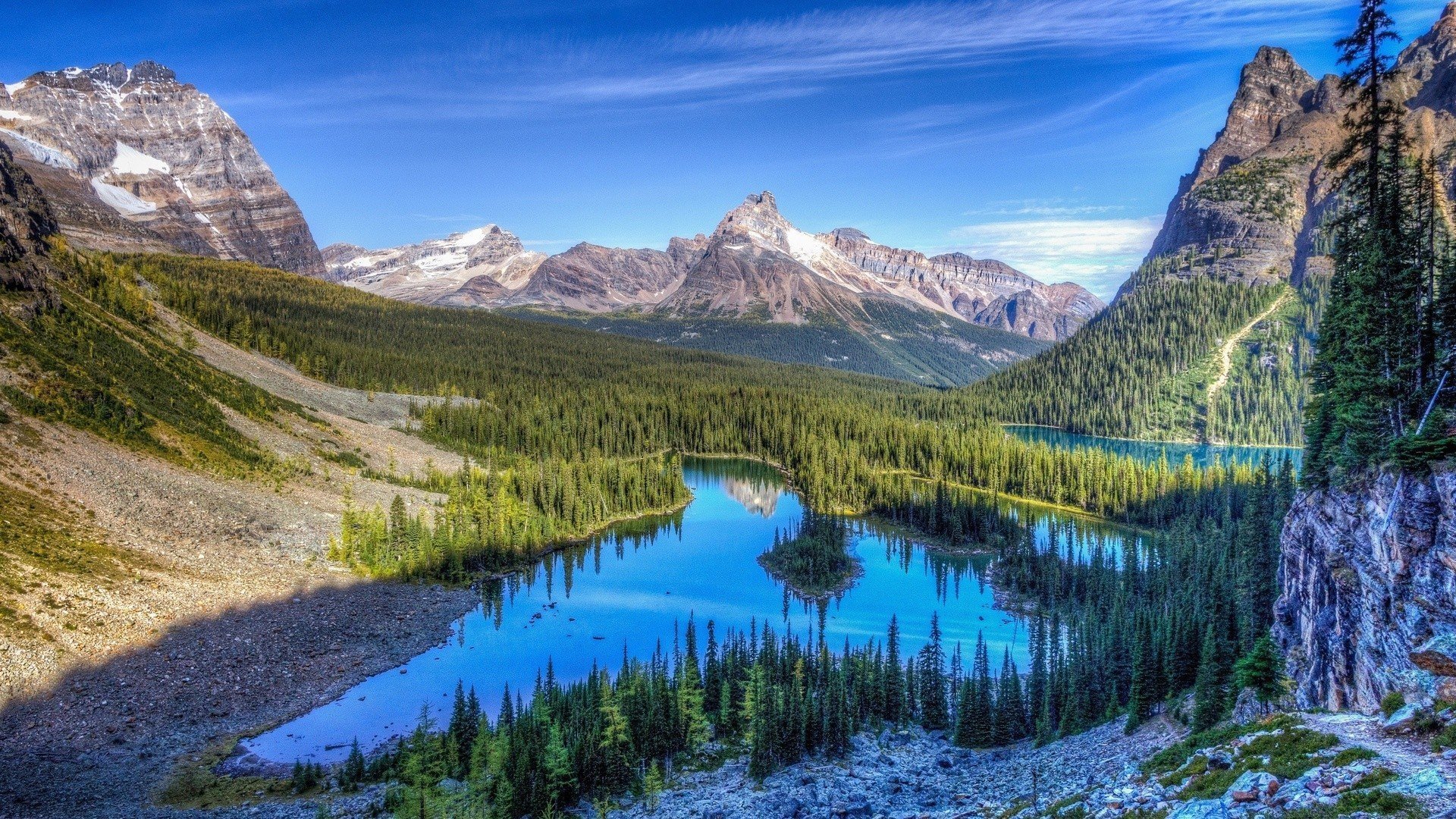 montagne neve rocce lago foresta cielo nuvole