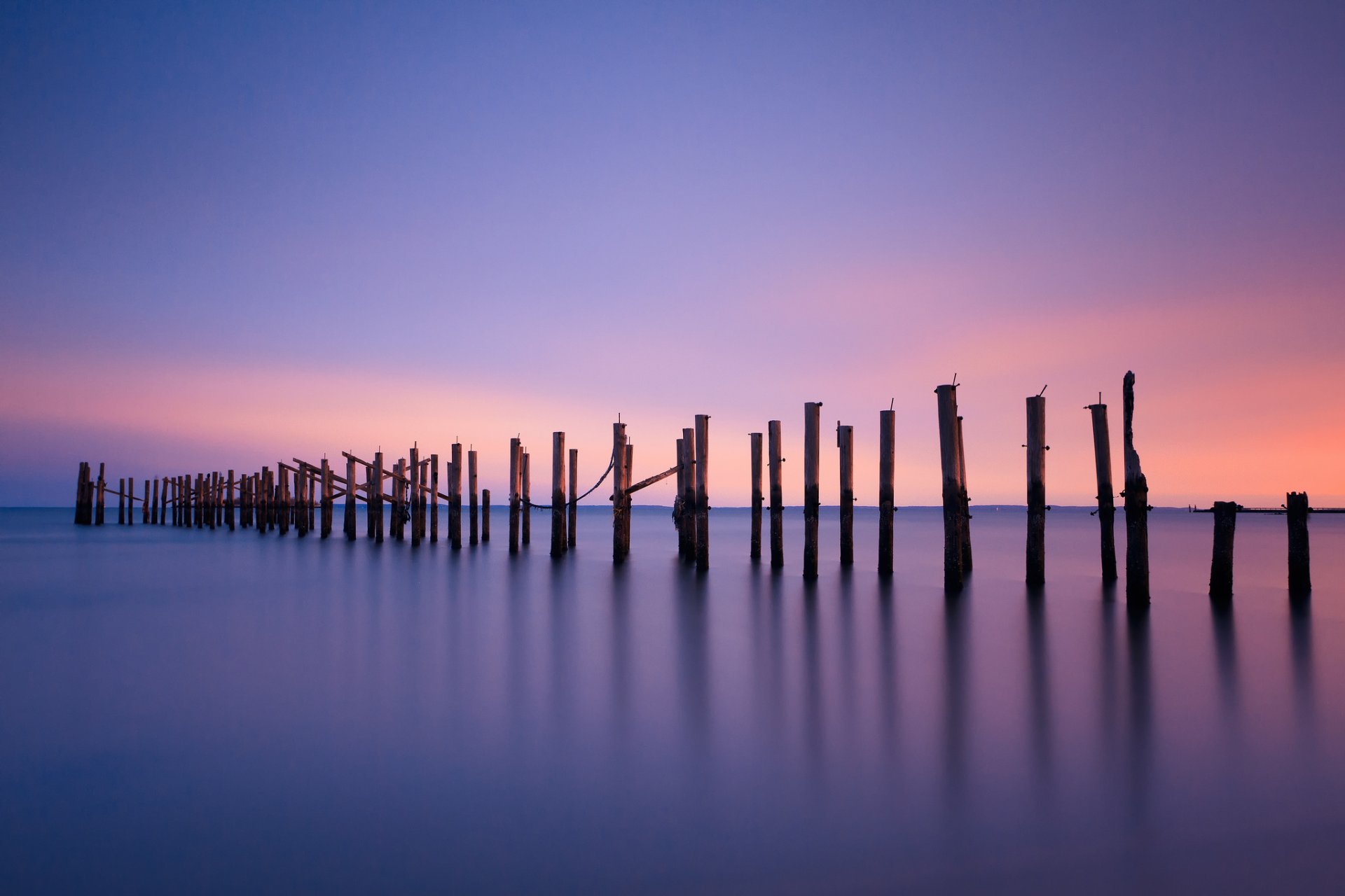 etats-unis océan piliers côte calme plage soirée coucher de soleil lilas ciel