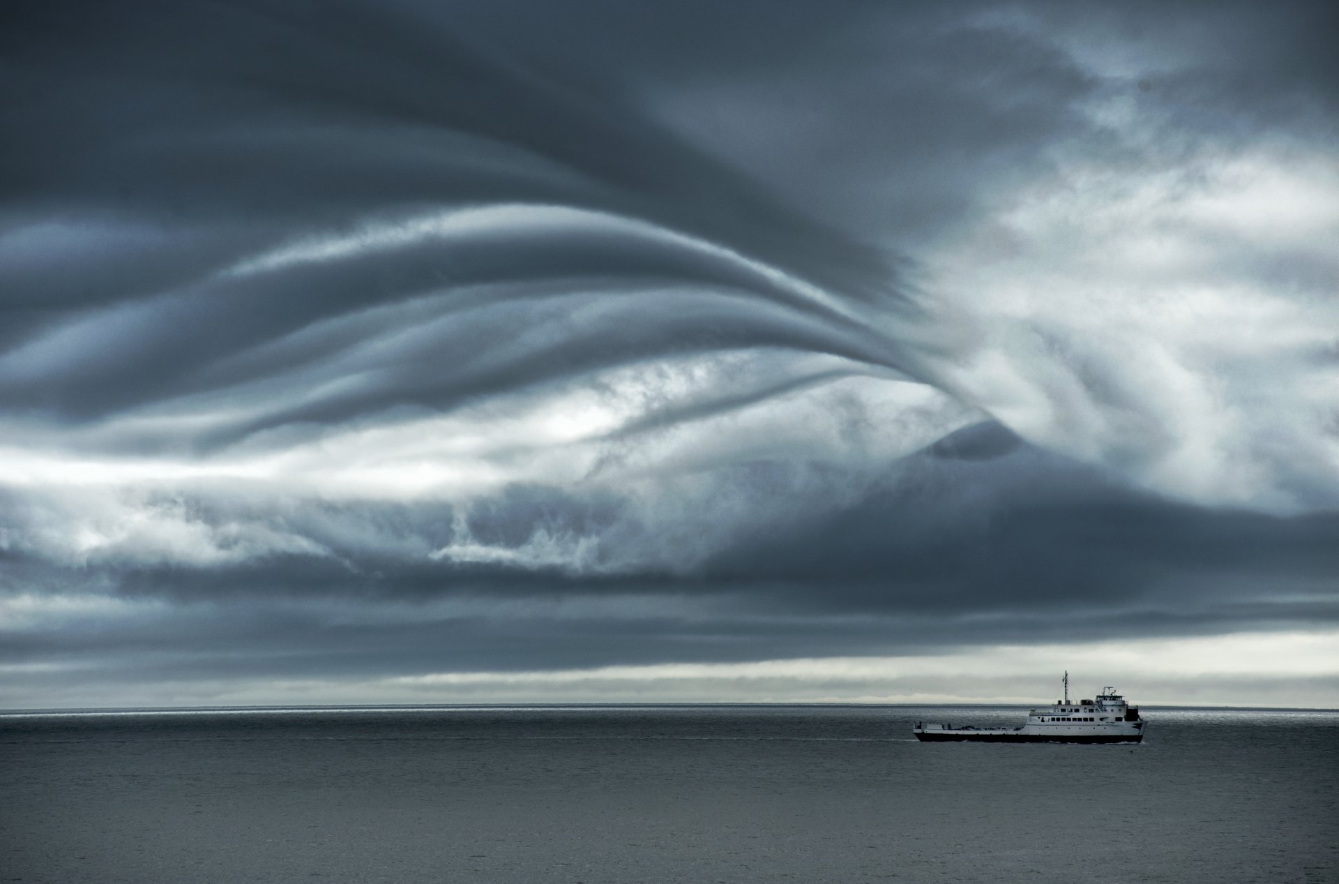 ferry sea clouds storm gray clouds horizon