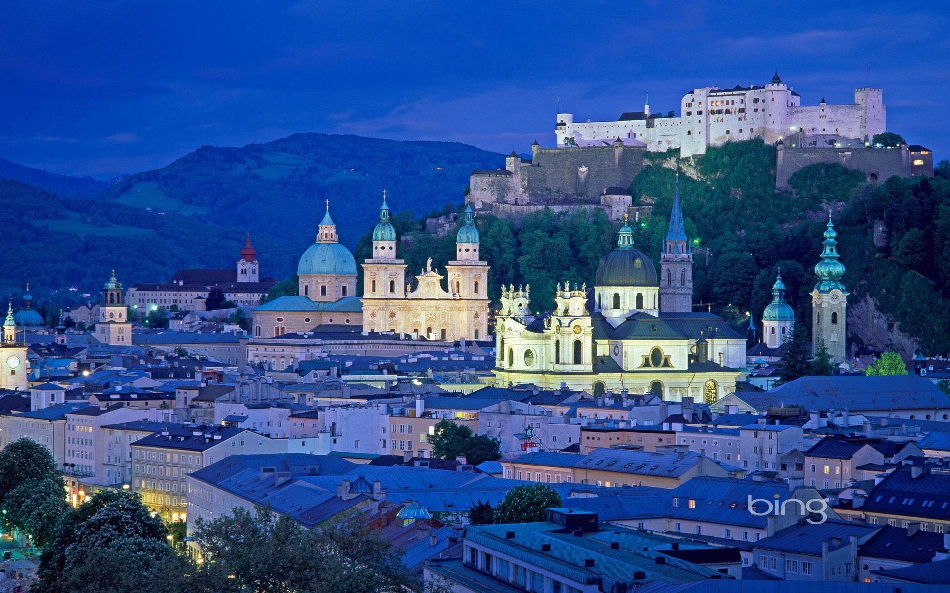 alzburg austria town mountain castle night lights architecture sky cathedral house roof tower dome