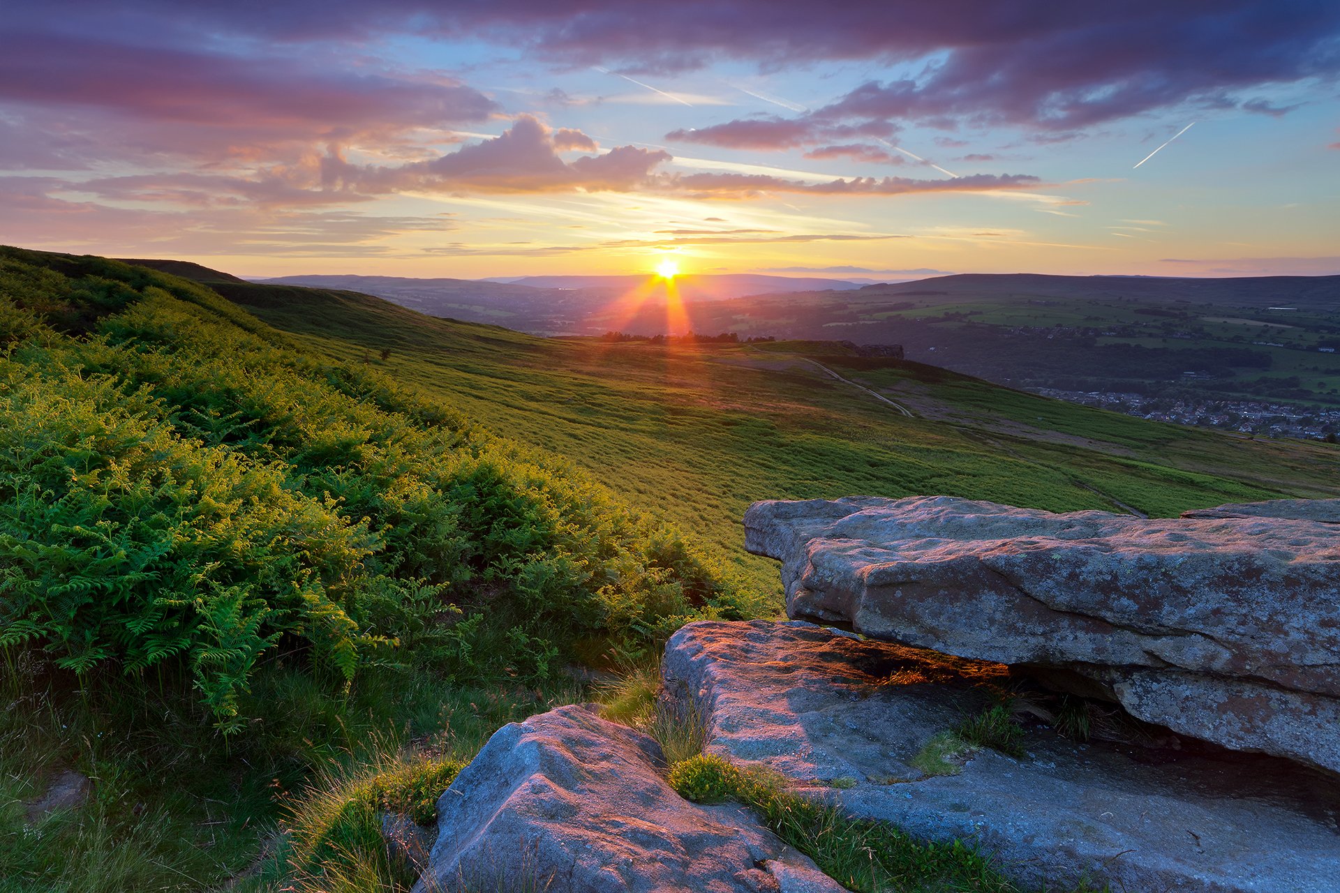 inghilterra yorkshire tramonto sole cielo nuvole rocce cespugli campi valle