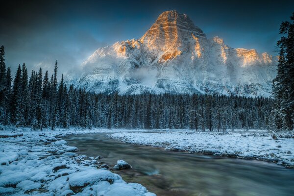 Frozen river on the background of the Chefren mountain