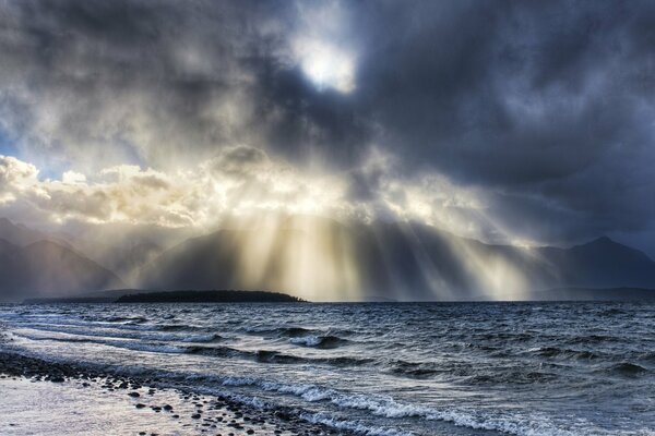 Clouds by the sea and rocks