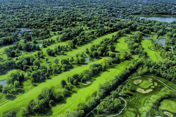 From the height of the flight you can see a beautiful landscape with fields and ponds