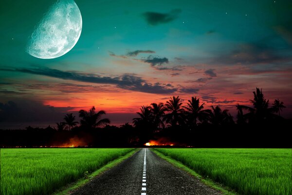 Camino a la puesta de sol ardiente a la luz de la Luna