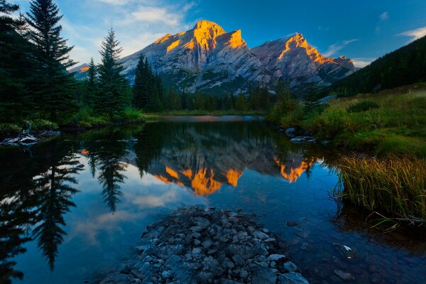 Nature with mountains, sunset on the lake