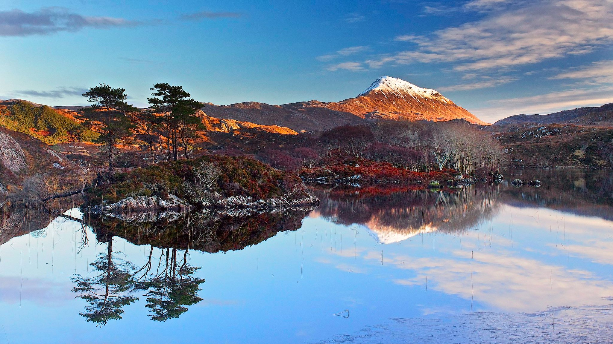 cotland sky clouds sunset mountain snow lake tree reflection island sea
