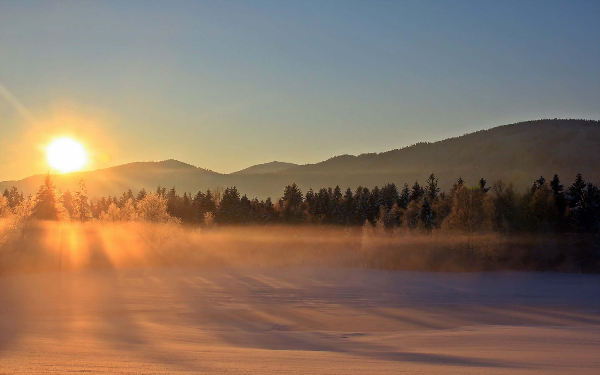 puesta de sol invierno niebla paisaje