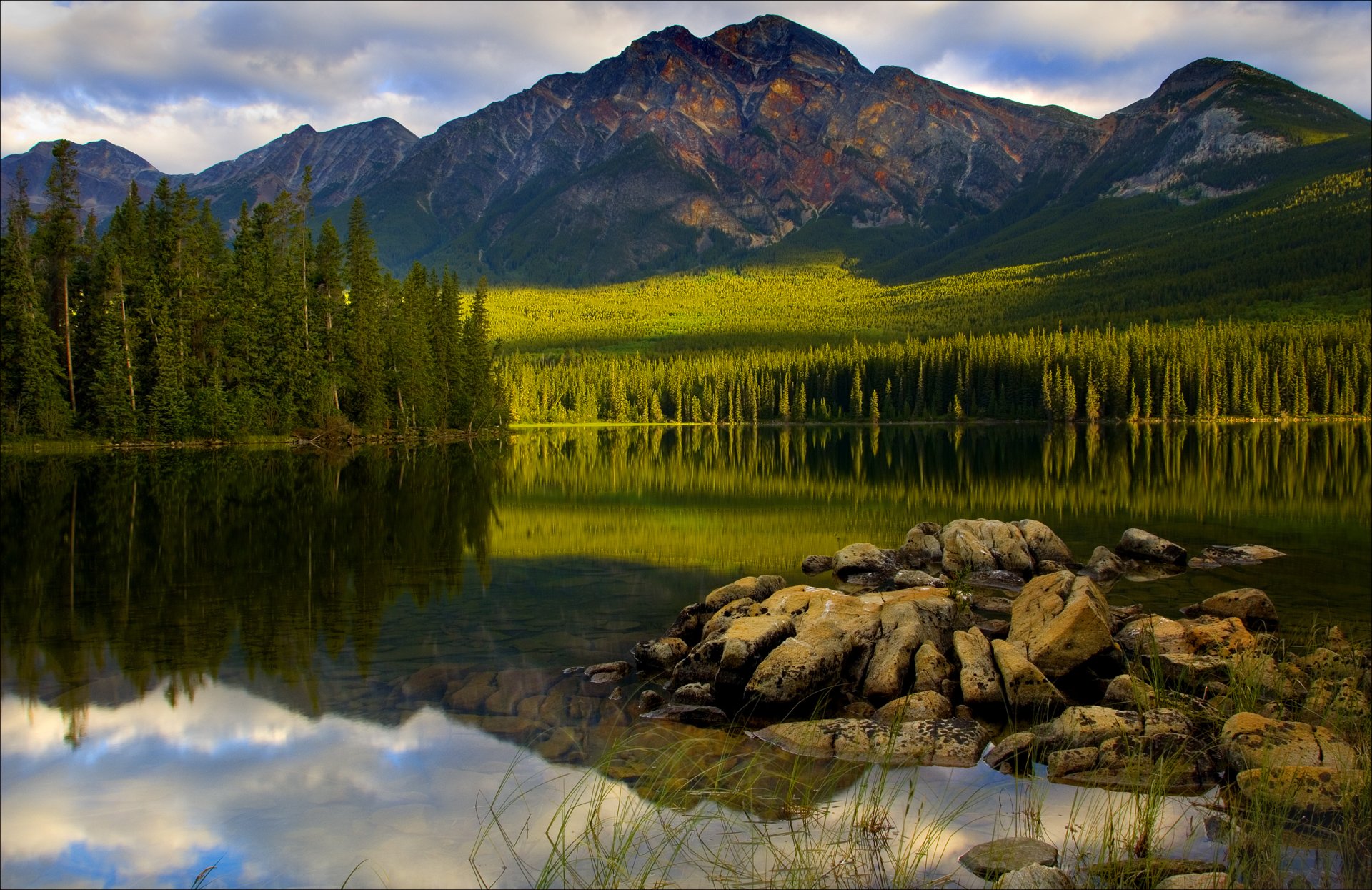 jasper national park canada sky clouds lake mountain forest tree sunset spruce stones reflection