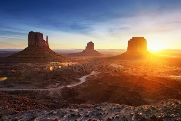 Mismatched mountains in the valley at sunset