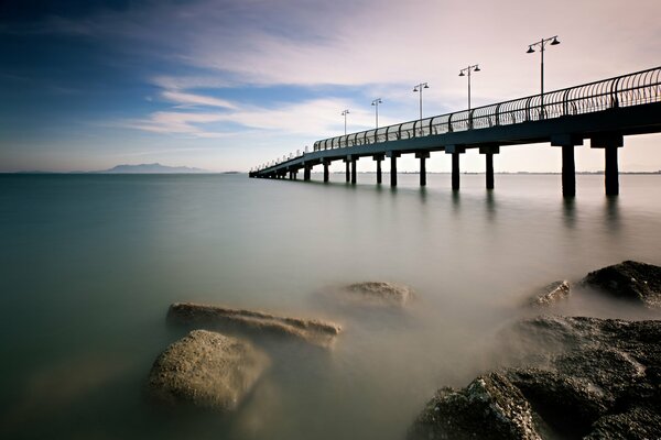 Morning at sea in Malaysia on the background of the pier